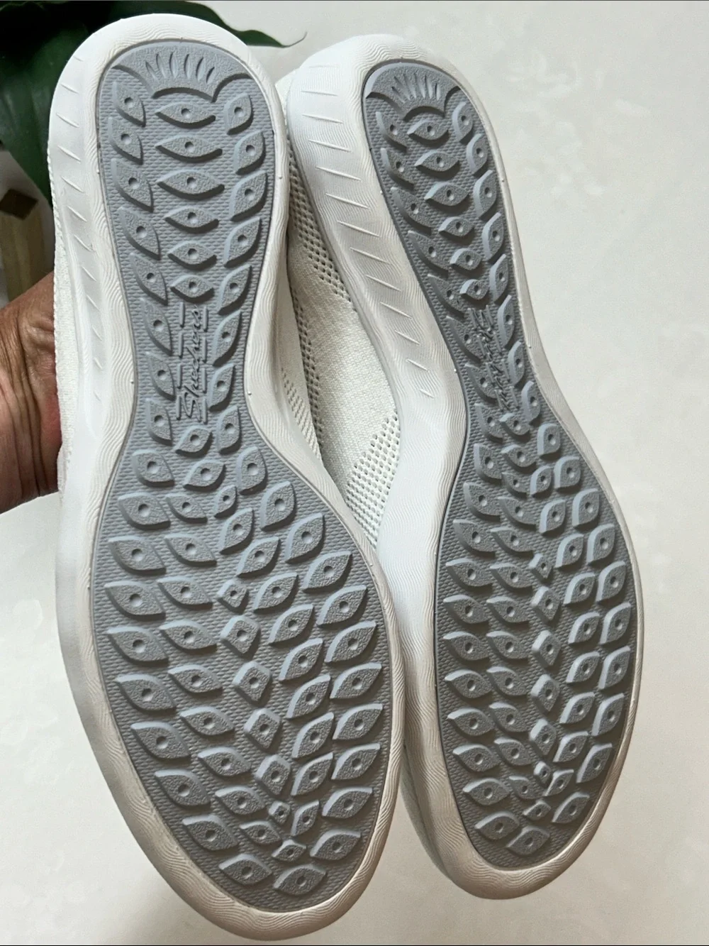 Skechers Women’s White Slip-On Knit Sneakers